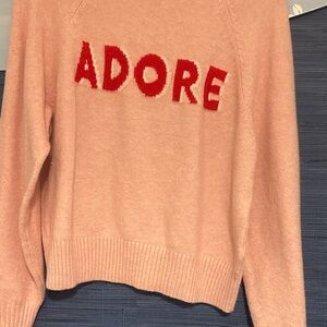 Adore Women's Soft Pink Sweater with Red Lettering